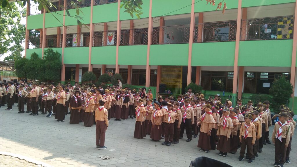 Our School's Students are lining for scouting event in front of school building